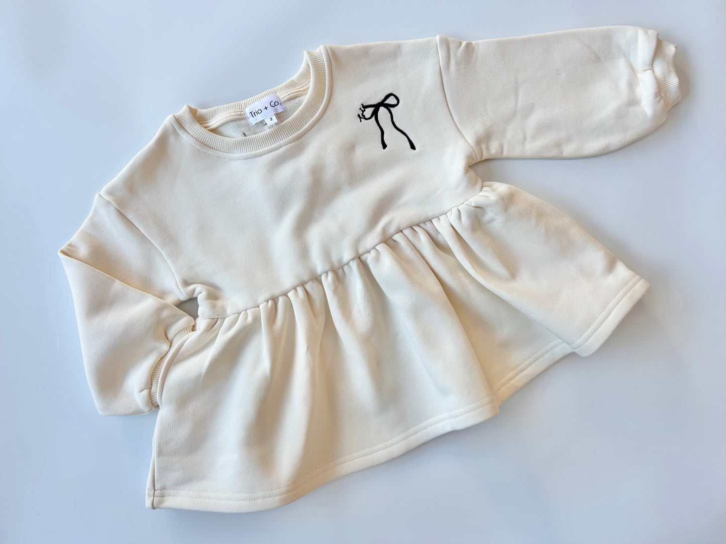 Winter Bow Peplum