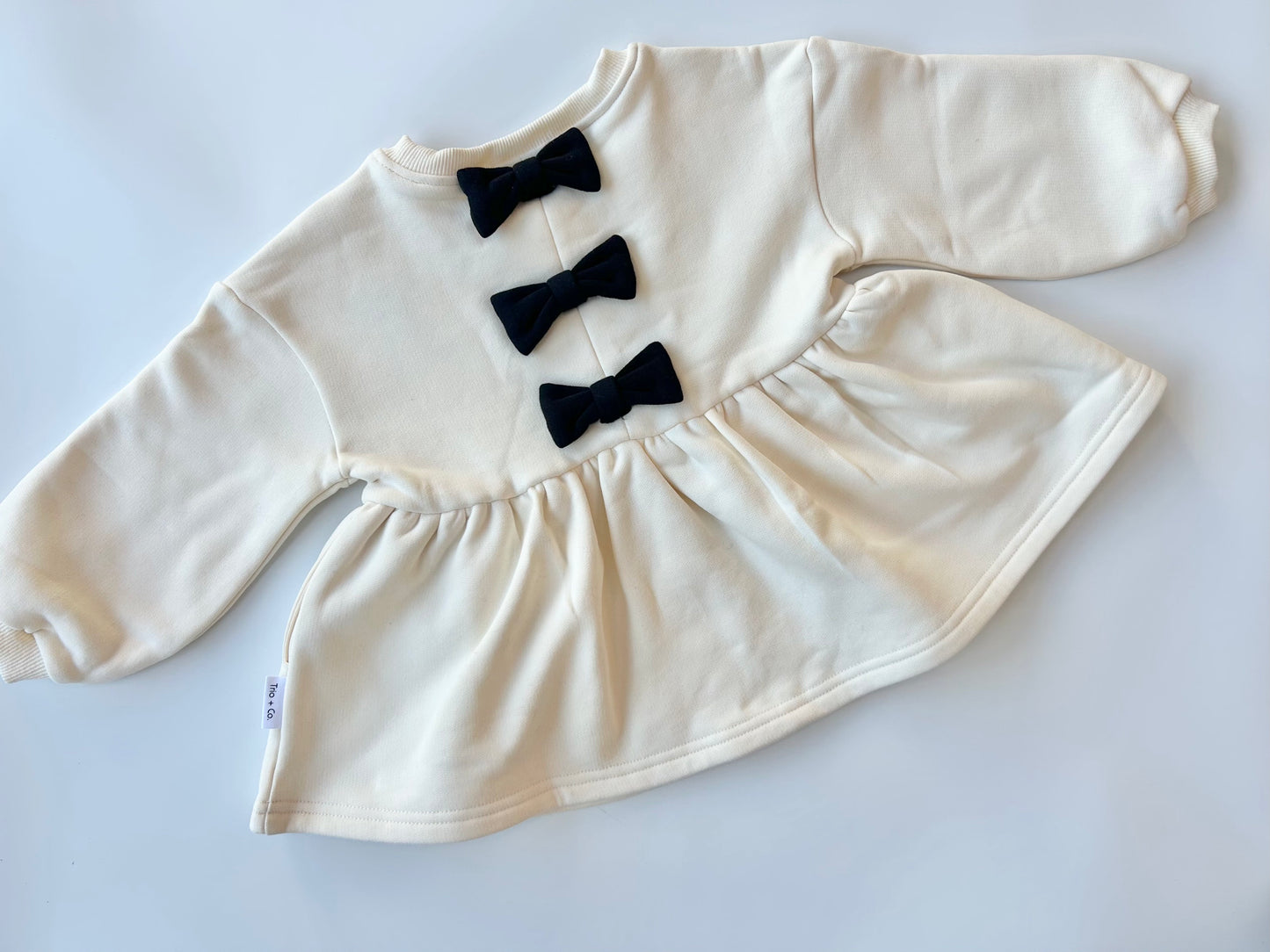 Winter Bow Peplum